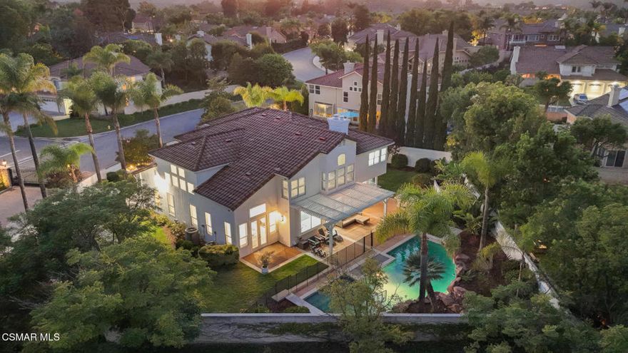 Welcome to 519 Turnbury Street, an elegantly updated residence positioned on a prime corner lot in the guard-gated community of Legacy Estates. This 5-bedroom, 4-bathroom home spans more than 3,800 square feet and has been upgraded throughout with an eye for quality and detail.The interior is bright and inviting, with soaring 20-foot ceilings and an open flow that connects each living space. The formal living and dining rooms are ideal for entertaining, while the family room offers warmth and comfort with its dual-sided fireplace. The interior is bright and inviting, with soaring 20-foot ceilings and an open flow that connects each living space. The formal living and dining rooms are ideal for entertaining, while the family room offers warmth and comfort with its dual-sided fireplace. A bedroom and full bathroom on the main floor provide flexibility for guests, an office, or playroom. The adjoining kitchen is the centerpiece of the home, showcasing custom cabinetry, quartz countertops, a striking backsplash, and a large center island.The adjoining kitchen is the centerpiece of the home, showcasing custom cabinetry, quartz countertops, a striking backsplash, and a large center island. A full suite of stainless steel appliances includes an oversized side-by-side refrigerator and freezer along with an 8-burner range. Thoughtful touches such as a walk-in pantry, coffee station, Lazy Susan, and spice rack make everyday living effortless. A bay window frames picturesque views of the backyard and sparkling pool, filling the space with natural light.Upstairs, the primary suite provides a private retreat with its own cozy fireplace, two spacious walk-in closets, and a luxurious bathroom featuring dual vanities, a makeup station, freestanding tub, and custom walk-in shower. Three additional bedrooms and remodeled bathrooms complete the second floor. Additional upgrades include newer tile and carpet, iron and glass entry doors, dual-pane Milgard windows, fresh interior and exterior paint, two newer AC units, and updated lighting and hardware.Outdoors, more than 13,400 square feet of flat, landscaped grounds create the feel of a private resort. A newly refinished Pebble Sheen pool and spa are paired with a built-in BBQ and refrigerator, gazebo lounge, fruit trees, and outdoor lighting, perfect for both quiet evenings and lively gatherings. The 4-car garage with drive-through access, abundant storage, and a driveway with parking for 8+ vehicles provides unmatched convenience.Located minutes from Wood Ranch Country Club, tennis courts, hiking trails, and award-winning schools, 519 Turnbury Street offers thoughtful upgrades, generous living space, and an exceptional setting within one of the area's most desirable communities.