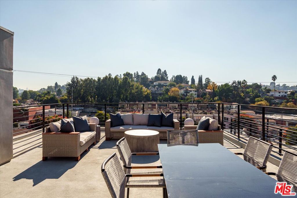 Located just steps from Ivanhoe Elementary, Griffith Park, and the vibrant corridor of Hyperion Avenue is The Selene, a newly developed collection of five exclusive luxury residences for sale and for lease offering style, sophistication, and understated luxury in one of Los Angeles' most convenient neighborhoods. 2822 Avenel is sun-drenched, with an open-concept floor plan and modern interiors that exude warmth. An expansive great room serves as the home's focal point for entertaining, with high ceilings, large window spans, and dedicated indoor-outdoor spaces for lounging and dining. The sleek kitchen is a perfect fusion of design and practicality, showcasing a generous eat-in island, ample white oak cabinetry, and a suite of high-end luxury appliances. The spacious primary offers a serene retreat with southern-facing views, a custom walk-in closet with white oak shelving, and a spa-inspired bath featuring dual vanities and a wet room with a freestanding tub. Two additional ensuite bedrooms complete the living arrangements. A large rooftop deck with panoramic views of the hills provides a retreat for relaxing in the sun or hosting a soiree. Additional features include a small dog run with artificial turf, a direct-entry 2-car garage, solar panels, and a convenient laundry closet on the bedroom level. Just a short a commute to Downtown LA and Hollywood and within minutes from the shops and restaurants at Sunset Junction, Atwater Village, and Hillhurst Avenue.
