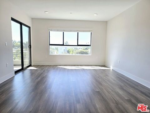 Photo of 5030 Rosewood Avenue #503, Los Angeles, CA 90004 (MLS # 26645835)