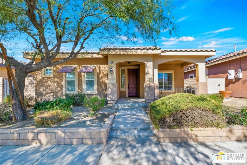 Discover your desert lifestyle at Verano in Cathedral City! This 4BD/3.5BA home with a private attached casita is the perfect blend of style, comfort, and flexibility. The casita- complete with its own entrance, kitchenette, bathroom, brand new A/C unit, electric meter, and balcony-is ideal for guests, extended family, or rental income. The main home is designed for seamless indoor-outdoor living. A large kitchen with stainless steel appliances flows into the open living area, featuring a cozy fireplace and sliders that lead to a spacious patio. The primary suite is a true retreat, boasting a spa-style bath with dual vanities, soaking tub, walk-in shower, and generous closet space. Two additional bedrooms provide comfort and versatility for family, guests, or a home office. At Verano, enjoy resort-style amenities-sparkling pools, lush parks, tennis/pickleball and recreation spaces-all with low HOA fees. Located near shopping, Palm Springs International Airport, the I-10 freeway, and a short walk away from Rio Vista Elementary, this home offers the perfect mix of convenience and flexible living.