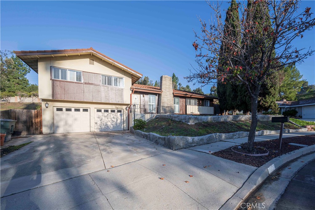 Don't miss this beautiful 4 bedrooms, 2 bathrooms single family house in a great neighborhood of East Thousand Oaks. Newly remodeled living room, dining room and bathrooms. Well landscaped, lush and extremely private backyard has fruit trees, entertainment patio, water fountain and vegetable garden. Rich laminate floors in living room, family room, dining room and all bedrooms has featured modern feelings and easy maintenance. Gourmet kitchen has large island for breakfast and opens to family room. Master suite has dual sinks, luxury shower and large closets. Two car garage has extra storage spaces on the ceiling.
Located on a quiet neighborhood with walk-in distance to elementary schools, Thousand Oaks High school, Cal Lutheran University and Trader Joe's. Close to shopping, parks, golf course and highway 23.
Come by and you will appreciate this beautiful home for you and your family.