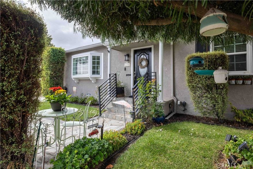 Charming 3 bedroom, 2 bathroom home in a highly sought-after Lakewood neighborhood. Lovingly maintained and thoughtfully upgraded over the years, this residence features gorgeous hardwood floors and a spacious family room filled with natural light. The kitchen is beautifully appointed with custom-built oak cabinets offering ample storage. Step outside to a large covered Trex deck, perfect for entertaining or relaxing, and enjoy the low-maintenance backyard with lush synthetic grass. Additional highlights include an oversized garage with utility sink and a whole-home water filtration system. With its thoughtful upgrades and timeless details, this move-in ready home is a true gem!