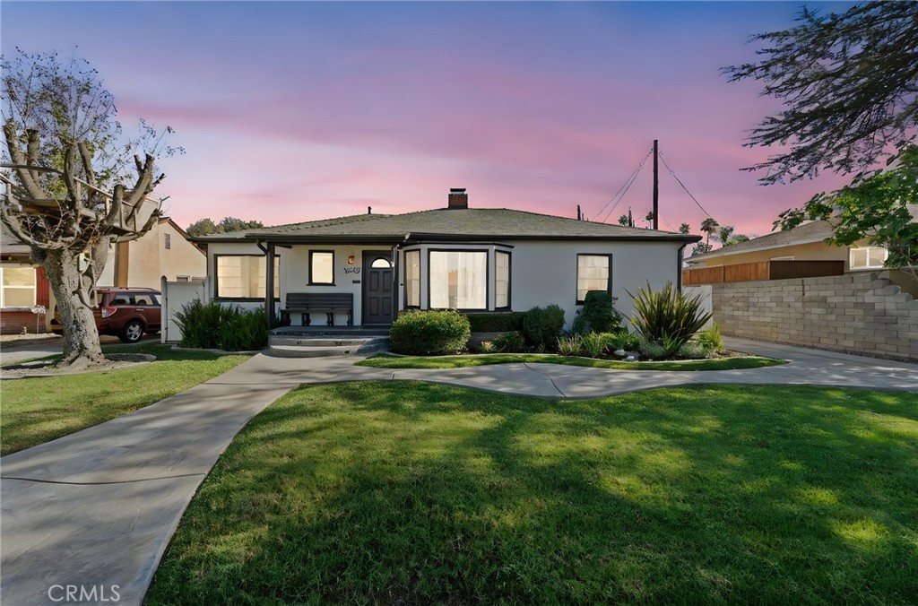 If you appreciate the craftsmanship, vintage details, and a neighborhood
that feels like home, welcome to 3515 Linwood Place, a 3 bedroom, 1.75
bath, Wood Streets classic filled with original charm in a wonderful
neighborhood. Built in 1948, this home features original hardwood floors,
lots of natural light, and an original vintage kitchen in beautiful condition
with original wood cabinets all the way up to the ceiling. Two bathrooms
thoughtfully restored to their 1948 glory. A very nice layout with no weird
additions gives the home great flow. Three generously sized bedrooms with
ample closet space, a large laundry room, central AC & heat, a cozy
fireplace, and a tankless water heater for modern convenience. Recent
improvements include new fixtures, fresh interior paint, with a new roof and
exterior paint completed in 2024, making it truly move-in ready. The
detached two-car garage sits at the end of an extra-long driveway with
additional parking behind the garage via alley access. The detached
garage has excellent ADU conversion potential (buyer to verify all permits
and requirements). The backyard is a private retreat with fruit trees,
flowers, shade, and perimeter walkways perfect for relaxing, gardening or
entertaining. Adding to the appeal, the home’s first trust deed has an
assumable $191k VA loan at an incredible 2.25% interest rate (buyer to
qualify). A rare opportunity to own a vintage gem with character, comfort,
and value in one of Southern California’s most charming neighborhoods.