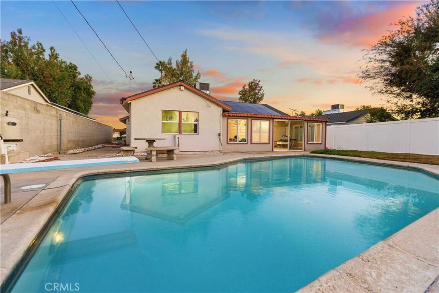 This beautifully remodeled Granada Hills home blends comfort, style, and functionality with thoughtful upgrades throughout. Featuring a new roof, solar panels, and a new HVAC system, it offers modern efficiency and lasting value.
The updated kitchen showcases stainless steel appliances, sleek finishes, and an open layout that connects seamlessly to the dining and living areas. Once outside a private backyard retreat with a Pebble-Tec pool and enclosed patio, perfect for entertaining or relaxing. Both bathrooms have been tastefully updated, including one with direct outdoor access, ideal for poolside convenience.
Additional highlights include a two-car attached garage, spacious driveway, and beautifully updated flooring throughout. Conveniently located near top-rated schools, shopping, and major freeways, this home offers the perfect balance of modern upgrades and prime location. Experience the best of Granada Hills living, move-in ready and designed to impress.