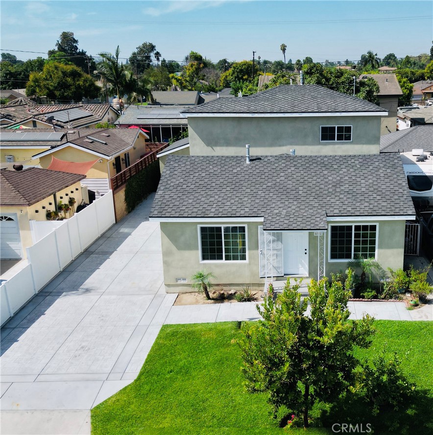 Located in the vibrant community of Downey, this modern and spacious home is surrounded by beautiful parks, trendy restaurants and shopping centers making it ideal for families. The home features 5 spacious bedrooms of which 3 are located downstairs plus 3 new bathrooms. This home is perfectly designed for spacious and modern living. Step inside and discover an new kitchen, newer flooring, new fixtures, new energy efficient windows. Stay cool all year round with new A/C, cutting edge tankless water heater. The exterior shines with new roof, new stucco, a freshly paved driveway leading to a new 2-car garage, offering ample space for your vehicles and storage needs, With convenient access to major freeways perfect for commuters. Don't miss out on your opportunity to own this home in Downey!