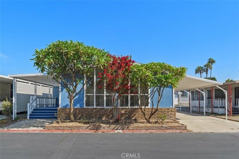 Photo of 1456 E Philadelphia St Spc 402 ST, Ontario, CA 91761 (MLS # IV26199570)
