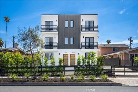 Photo of 2000 Hillcrest Drive, Los Angeles, CA 90016 (MLS # MB26091324)