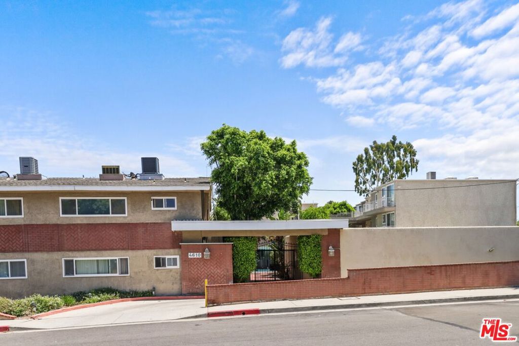 This stylish and updated two story townhome offers a blend of modern comfort and spacious functionality with recessed lighting throughout first floor. It's open floor plan living, dining and built in bar with 1/2 bath for guests opens onto a wrap around balcony which flows seamlessly through to the kitchen and breakfast area. Rich hardwood floors flows throughout the main floor. The updated cabinetry in the kitchen includes granite countertops and backsplash with stainless steel refrigerator and oven/range with a black dishwasher which offers a two tone effect against the white cabinetry. Off the kitchen is a new stacked washer & dryer ( one pictured is original one). The floating staircase adds to the open floor plan as you ascend to the 3 bedrooms upstairs. The central hall and bedrooms have laminated flooring. The master bedroom opens onto the balcony with views of the city lights along Ventura Blvd and also the treetops of the hills south of the Blvd The master bathroom has a large walk in shower and mirror over the sink. The other two bedrooms have similar views and the hallway bathroom has a full tub with shower on tiled floors. The condo project has a community pool, BBQ area and deck area for lounging as well as a community laundry room, if needed for those extra loads of laundry. Unit comes with a 2 car tandem parking in a gated subterranean garage which leads directly into the complex. Condo building is located less than 1/2 block from Ventura Blvd with it's shops and Sherman Oaks Galleria, Whole Foods and many more shopping and eating spots.