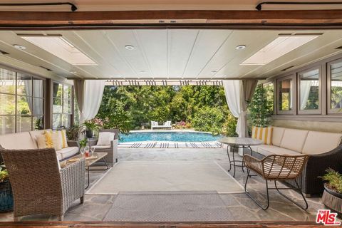 Photo of 2299 Beverwil Drive, Los Angeles, CA 90034 (MLS # 25590433)