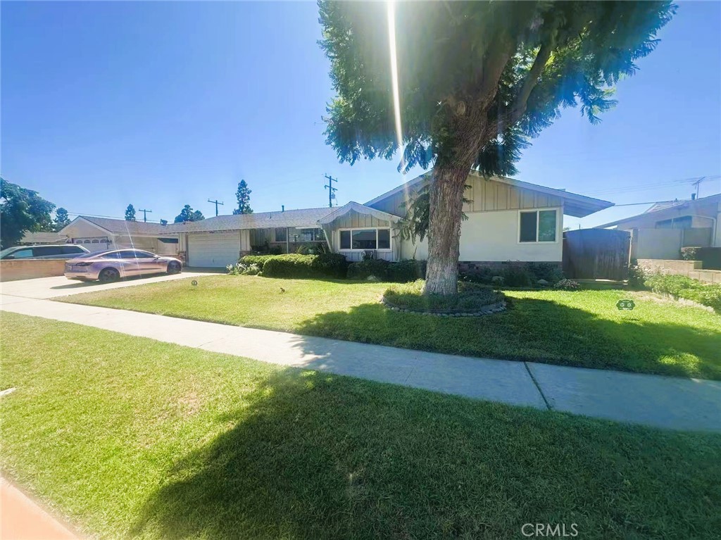Discover this beautifully renovated 4-bedroom, 2.5-bathroom home nestled on a generous 8,631 sqft lot in a quiet neighborhood. Built in 1959, this residence underwent a complete transformation 8 years ago, blending classic charm with contemporary living.
Step inside to 1,981 sqft of meticulously updated space. The heart of the home is a stunning kitchen, boasting new cabinetry and a spacious island, perfect for culinary endeavors. The adjacent big living room features a convenient sliding door, seamlessly connecting indoor comfort with potential outdoor entertainment. Modern conveniences include an included washer, dryer, and a 3-door refrigerator, plus a brand new roof from the renovation.
Enjoy the unbeatable location – just approximately 5 miles from the magic of Disneyland Park and with easy access to the I-5 freeway and the 22 freeway. For families, the home is a mere 3 blocks from a high school, offering excellent educational opportunities.
This move-in ready home offers peace, privacy, and unparalleled convenience. A true must-see!