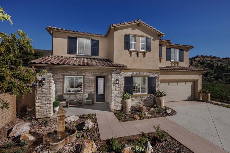 Your Move-In Ready Luxury Home Awaits in Pacific Royal Oaks.
Discover Plan 3 at Pacific Royal Oaks, one of only 24 exclusive homes in this serene gated community. Situated on a generous 24,035 sq. ft. lot, this stunning new luxury home offers 4,390 sq. ft. of beautifully crafted living space, featuring 5 bedrooms and 4.5 bathrooms.
Designed with both function and elegance in mind, the home features a junior suite with a private entrance, kitchenette, and en-suite bath—ideal for multi-generational living or long-term guests. The main floor includes a large flex room with French doors, perfect for a home office or den, and a stunning great room anchored by a double-sided fireplace and an extended slider that opens to the backyard, blending indoor and outdoor living.
The chef-inspired kitchen is fully upgraded with premium Dacor appliances, a built-in refrigerator, an extended island, an undercounter wine and beverage chiller, upscale cabinetry with glass uppers, and enhanced LED lighting throughout. Beautiful upgraded flooring flows throughout the home, adding warmth and sophistication to the open floor plan.
Additional features include a 3-car tandem garage, a loft, and a thoughtfully zoned layout ready to accommodate your dream backyard—whether you envision a pool, outdoor kitchen, or custom entertaining area.
Enjoy convenient access to the 118 Freeway, The Vineyards at Porter Ranch, and top-rated schools, along with nearby scenic hiking trails like Hummingbird Trail. With no Mello-Roos fees and immediate move-in availability, this exceptional home is ready for you to make it your own.
*Photos shown are of the Plan 3 model home and are for representation purposes only. Actual features, finishes, and layout may vary.