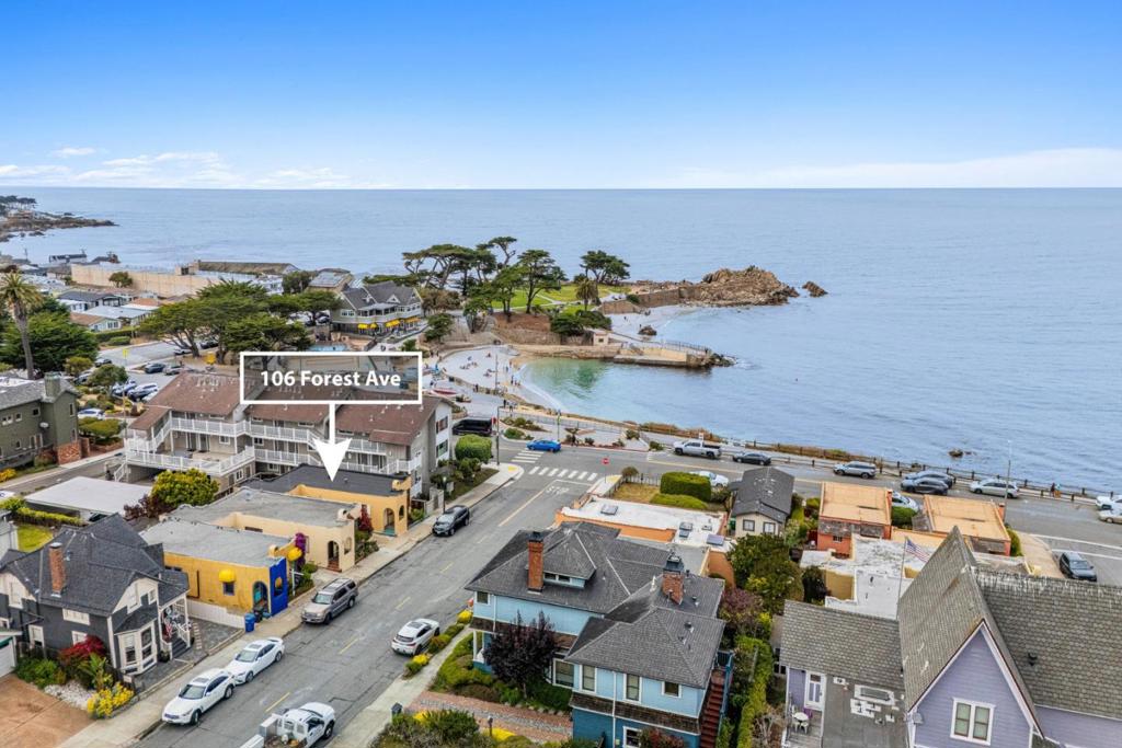 Incredibly charming cottage located just steps from the ocean at iconic Lovers Point in Pacific Grove. Enjoy stunning, unobstructed ocean views and the ultimate beach lifestyle in this low-maintenance coastal retreat. Featuring a large, light-filled living room, two comfortable bedrooms, and one full bathroom, this home offers relaxed elegance in an unbeatable location. The private and inviting backyard is perfect for morning coffee or evening gatherings. Just a short stroll to downtown Pacific Grove's shops, restaurants, and coastal trails is oceanside living at its best.