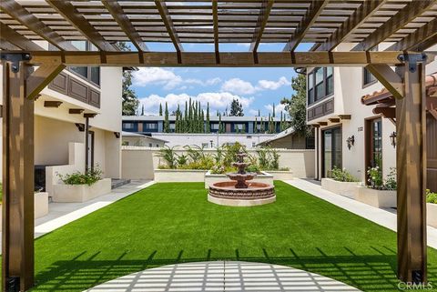 Photo of 89 N Grand Oaks Ave #103, Pasadena, CA 91107 (MLS # WS26081737)