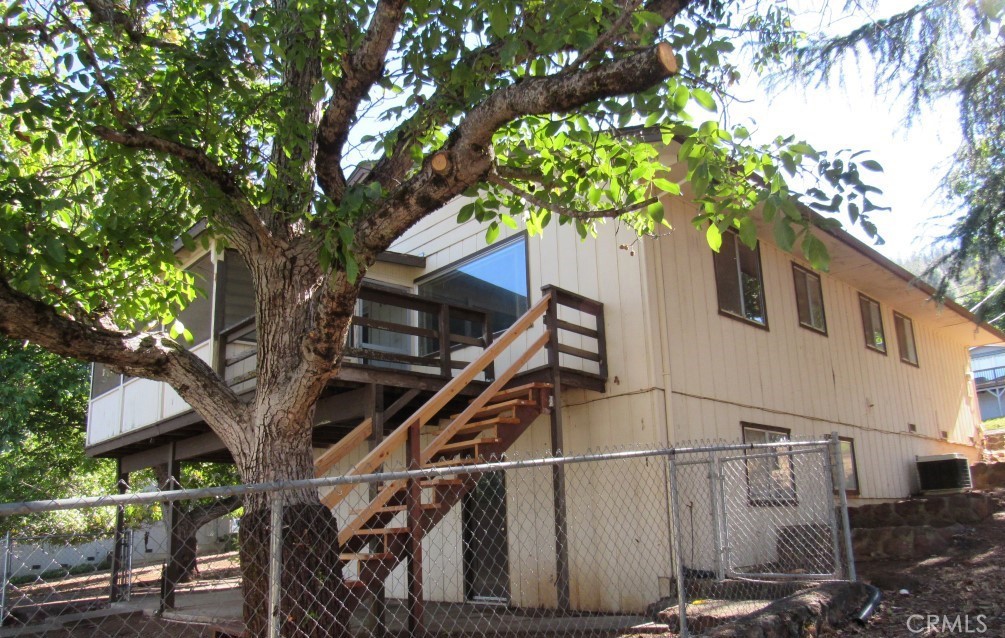 Drastic price reduction on this spacious home! 2 bedrooms 1 bath on the main level plus 1 bedroom 1 bath downstairs by the garage. This home boasts lots of decking with part of the deck closed in and covered off the living room. There is a spacious dining room and generous kitchen. The separate laundry room is located nearby so handy for multitasking. This lovely home is well located in the beautiful community of Riviera Heights just waiting for you to make it your new home.