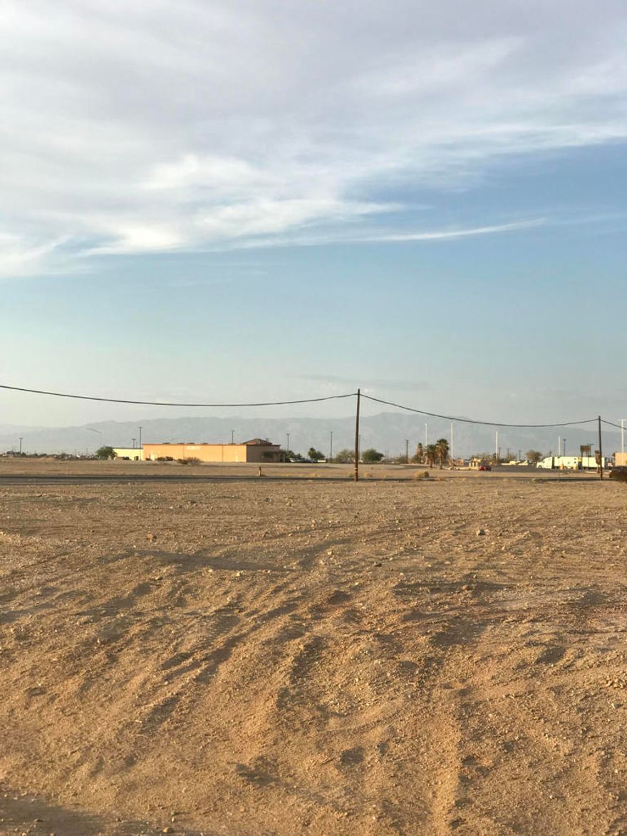 This unique piece of property is a blank canvas to built your dream home and  enjoy the blue sky, mountain views and the relaxing tranquility of the desert. It's nestled on a prime location less than a mile to the Highway CA-86 and the Salton City Travel Plaza; Subway, KFC, Yogurt Land, The Coffee Bean, Jack in the Box and more...  The utilities are very close; the electricity pole is on the street and the water service is on the next parcel. The buyer and buyer's agent are strongly advised to exercise their due diligence and investigate including but not limited to: Lot dimension, boundaries, utility providers, costs, zoning etc.