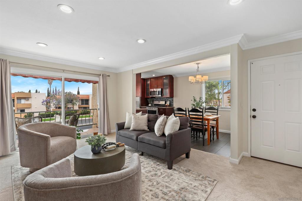 No Special Assessments! Don't miss this beautifully upgraded upper-level 2 bed, 2 bath condo located in the heart of Mira Mesa! Whether you're a first-time homebuyer or savvy investor, this bright and airy end unit offers incredible value and endless potential. Enter to gaze upon a spacious, open floor plan. Enjoy thoughtful touches throughout, including recessed lighting, crown molding, and dual-pane windows. The remodeled kitchen boasts granite countertops accented by a mosaic tile backsplash, custom cabinetry, and stainless steel appliances, while the primary bath showcases dual vessel sinks and a custom vanity. The large primary bedroom and well-placed hall bathroom add to the desirable layout. A convenient washer/dryer closet on the balcony takes the chore out of laundry day. What sets this home apart is its exceptional location near a variety of everyday conveniences. It’s located close to shopping centers, Mira Mesa Community Park and its anticipated new Aquatic Center in 2026, daycare facilities, the local library, and more—making it easy to access many services and recreational options. Casa New Salem I also offers desirable community amenities, including a pool and hot tub. Located just minutes from major technology employers, offering a convenient location that can help reduce commute times and support a balanced daily routine. With a broad range of nearby resources and convenient access to major freeways, this property presents a great opportunity to live in one of San Diego’s well-connected and established neighborhoods.