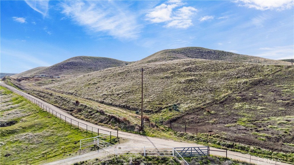 Welcome to an exceptional piece of land, offering a unique opportunity to create your own tranquil retreat. This picturesque property boasts three distinct building site areas, providing versatility and potential for a variety of developments.
The property is easily accessible with roads running through its expanse, ensuring convenient transportation and connectivity. In addition, the property is thoughtfully fenced, with a gulley providing natural boundaries and adding to the property's charm and character. With a strategic location nestled between two existing homes, this property offers a sense of community while still providing ample privacy for its future owners.
