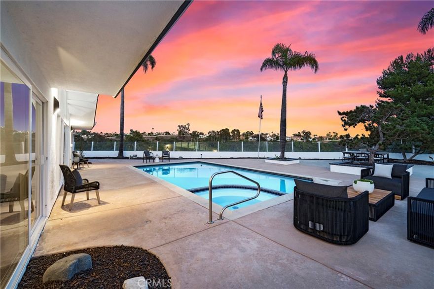 Welcome to 31802 Isle Royal, a rare opportunity to own a Joseph Eichler inspired-design home, nestled on a peaceful, private street with elevated views of the El Niguel Golf Course. Truly an outstanding Single level home with absolutely "no steps" located within the coveted area of "National Park" with NO HOA, and only minutes away from the Pacific Ocean. Step inside and experience the hallmarks of Eichler's visionary architecture--signature post-and-beam construction and floor-to-ceiling glass walls. This residence, with a southern exposure,  provides 4 bedrooms, 2 bathrooms, vaulted ceilings, new carpet throughout, both exterior and interior new paint, multiple skylights, separate dining area, family room with fireplace and an approximate 15,300sqft site offering outstanding entertainment options and the ability to add an ADU or pool house for the large in-ground swimming pool. The rear wall of the dining and family room areas is comprised of mostly glass. The Master suite has direct access to the outdoor jacuzzi & pool, mirrored closet doors. The master bath includes two sinks, walk-in shower and newer fixtures. The kitchen area includes an additional sky light, five-burner gas range, double ovens, trash compactor, dishwasher and plentiful cabinet space. This residence truly qualifies as "open & spacious" and "light & bright".  Oversized 2-car garage is partially finished, contains additional storage cabinetry and opens to an oversized 2-car driveway. This single-level mid-century modern gem captures abundant natural light throughout the day and offers a seamless connection between indoor and outdoor living. This home embodies the California modern ethos Eichler championed-- with its clean lines, minimalist facade, and warm indoor-outdoor transitions. It’s ready for your vision: preserve its architectural integrity while incorporating your own modern finishes to create a truly bespoke residence. Don’t miss your chance to own a legacy in one of Laguna Niguel’s most desirable coastal communities.. Excellent proximity to the Pacific Ocean and the World Renowned Salt Creek Beach with its famed surfing breaks, the Ritz Carlton and Waldorf Astoria Resorts! Minutes away from Dana Point with both its Harbor and Lantern District offering numerous shopping and dining opportunities as well Laguna Beach!
