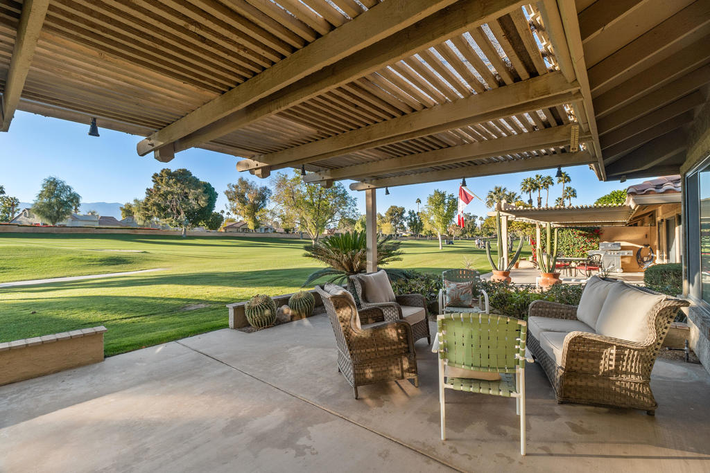 Take advantage of a great price reduction! Stunning South-Facing Golf Course Condo in Woodhaven Country ClubWelcome to this beautifully upgraded 2-bedroom, 2-bathroom condo, perfectly positioned on the golf course in the desirable Woodhaven Country Club. This meticulously maintained unit is being offered fully furnished and is ready for you to move right in and start enjoying the perfect desert lifestyle.The bright and airy interior features brand new windows and a complete HVAC system, installed within the last three years, ensuring comfort and efficiency year-round. The south-facing patio offers breathtaking views of the golf course, with the West mountains in the distance - the ideal spot to unwind and take in stunning sunsets.Community Amenities Include:18-hole championship golf courseTennis and pickleball courtsFitness centerFull-service clubhouse with dining and drinksFour heated and fenced community pools with spasWoodhaven Country Club is a gated community with a guard at the entrance, offering peace of mind and security. The community is known for its friendly, social atmosphere, where residents quickly become friends. Plus, you'll love the convenience of being within walking distance to dining, shopping, pharmacies, and other essentials.This is the perfect opportunity to own a turnkey condo in a sought-after, active, and welcoming community. Don't miss out - come experience the best of golf course living in Woodhaven Country Club today!