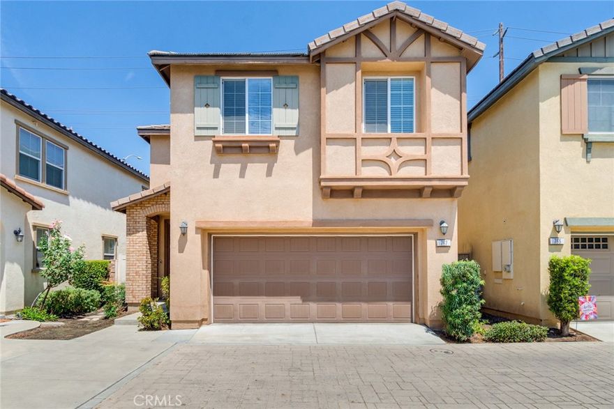 This stunning two-story home is located in the highly desirable and scenic Serrano Community. Recently refreshed with new interior paint, this modern residence features 3 spacious bedrooms and 2.5 bathrooms. Step inside to a bright, airy living room that flows into an open floor plan, connecting to a generous dining area and an upgraded kitchen. The kitchen impresses with rich dark wood cabinets, stainless steel appliances, a stylish two-level granite countertop and a walk-in chef’s pantry.Upstairs, you'll find three great size of light filled bedrooms which is including a luxurious primary suite. The primary bathroom offers dual sinks, a relaxing soaking tub and a separate shower. The spacious indoor laundry room adds convenience with ample storage space. Additional highlights include a two-car attached garage with direct access, a downstairs guest bathroom, water softener and a tankless water heater. The beautifully landscaped backyard features a grape trellis and fruit trees—perfect for outdoor entertaining or relaxing evenings.

Community amenities include barbecue grills, picnic tables, an outdoor fireplace and a kids' playground, providing great outdoor entertainment fun for families. Conveniently located near schools, shopping centers, markets, parks and with easy access to Freeway 210, this home offers the perfect blend of luxury, comfort and accessibility.