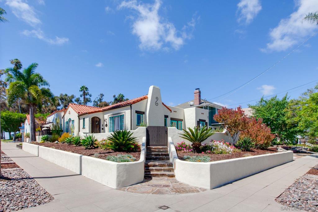 Discover 1602 Granada Avenue, a designated Historic Spanish home perched on an elevated corner lot. This residence seamlessly blends timeless architecture with modern living. The interior is bright and spacious, featuring original details like antique archways, coved ceilings, a Bachelder tiled fireplace, and original hardwood floors. The formal dining room, enhanced by French doors, leads to a front patio, providing the ideal Southern California indoor/outdoor living experience. A nearby bonus room serves as an inviting breakfast nook or office space. The kitchen has been tastefully updated with new cabinetry and flooring and includes a generous walk-in pantry. The primary suite on the main floor offers a spa-like retreat with dual sinks, heated floors, a walk-in shower, and a custom walk-in closet. Additional bedrooms offer flexible use, including the option of a family room with tri-fold doors to a serene backyard oasis complete with a pergola. Enjoy modern comforts such as high ceilings, air conditioning, updated electrical, and tankless water heater. Located a block from Balboa Golf Course and close to South Park’s lively mix of cafes, restaurants, and shops, this home offers an exquisite combination of historic charm and contemporary living. The seller has been busy preparing their home so you can enjoy it as much as they have, and here are just a few of the ways. Physical Home Inspection Done. Termite Inspection Done. Chosen Repairs Done. Don’t miss out on the opportunity to make it yours.
