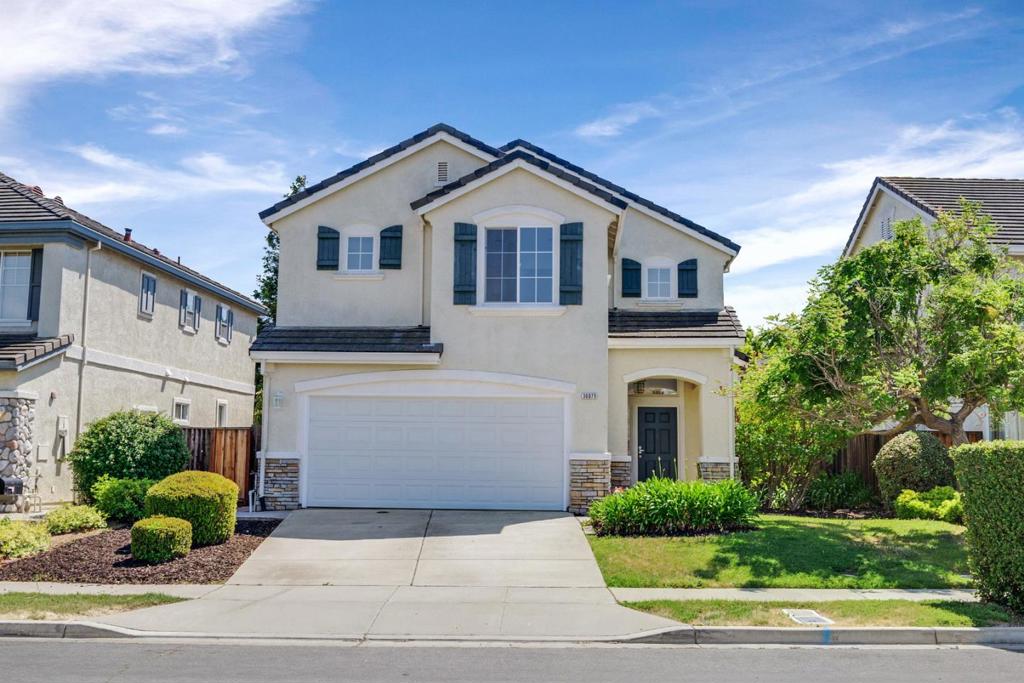 Beautifully updated Pulte-built home in sought-after Mayhews Landing! This 4-bedroom, 3-bath residence features soaring ceilings, abundant natural light, and a versatile layout perfect for modern living. The main level offers a bedroom and full bath ideal for guests or multigenerational living. The kitchen includes granite countertops, a center island, stainless steel appliances, and a sunny breakfast nook with views of the private backyard. The family room with fireplace and breakfast nook overlook the private backyard, creating a seamless indoor-outdoor flow. Upstairs, a loft offers flexible space for a home office or lounge, while the oversized primary suite includes a walk-in closet and dual-vanity bath. Additional highlights include hardwood and tile flooring, a downstairs laundry room with electric and gas hookups, and an attached 2-car garage. Northeast-facing and close to Dumbarton Bridge, Hwy 84/880, Challenger School, Meta, Lucid, and tech shuttles. Backing to open space, the community enjoys a tranquil setting near the Newark Slough and Don Edwards San Francisco Bay National Wildlife Refuge, with scenic trails and wetlands just minutes away.