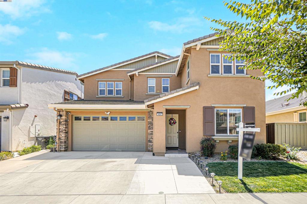 Welcome to this beautiful 2 story home in the highly sought-after Ventana Homes community—the perfect place for families looking to relocate to the Valley without sacrificing convenience or comfort. Enjoy a prime location just minutes from the ACE train for easy commuting, a quick drive to downtown Tracy, and a short stroll to the serene Hidden Lake for weekend walks and family outings. Step inside and fall in love with the bright and open floor plan, designed with today’s busy families in mind. The spacious living areas flow seamlessly, offering the ideal layout for both daily life and entertaining. Beat the Valley heat with central A/C and retreat to your private backyard oasis featuring a sparkling in-ground pool, secure safety gate, and a fully equipped outdoor kitchen—perfect for BBQs, birthday parties, and making lasting memories. This home features a full downstairs bedroom and bathroom, ideal for guests or multi-generational living. Upstairs, enjoy dual master suites, each with walk-in closets and spacious en-suite bathrooms. The main suite feels like a luxury retreat with his-and-hers walk-in closets, a spa-style soaking tub, and a beautiful walk-in shower. The possibilities are endless! Come see for yourself!