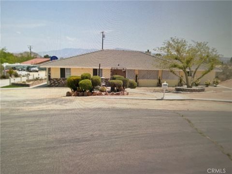 Photo of 15435 Pirinda Road, Apple Valley, CA 92307 (MLS # CV26067921)