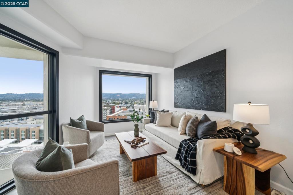Experience luxury living at Pacific Park Plaza in Emeryville. This beautifully designed 1 bed, 1 bath condo features updated kitchen and bathroom, sweeping eastern facing views, and a bright open floor plan. Enjoy convenient amenities such as on-site gym, pool, tennis court, sauna, community room, dedicated parking, EV charging stations, guest parking and 24-hr security desk. Close to Emeryville Public Market, Bay Street Shopping, water front trails, cafes, parks, and transit including express bus to SF. Don’t miss it!
