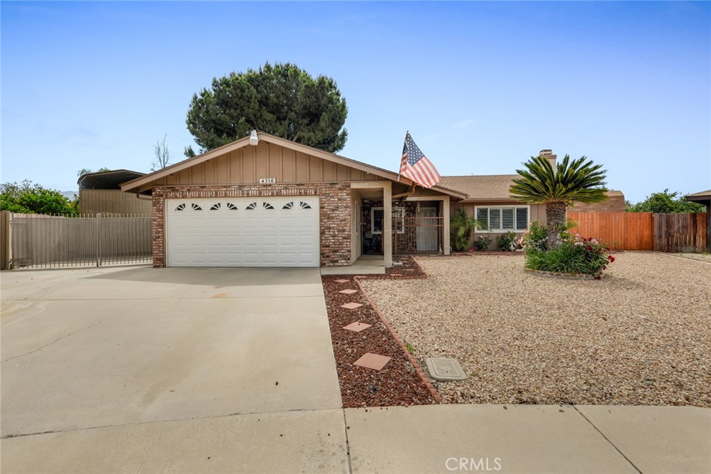 This well-maintained home has so many nice amenities! A Spacious living room with a fireplace, and open floor plan, the kitchen has granite countertops, laminate flooring in the kitchen, living room, and hallway, retextured walls and ceilings, custom crown molding & baseboards throughout, wood shutters, ceiling fans, separate laundry room inside, large covered patio, RV parking plus a Mobile Home Aluminum Cover, 2 sheds, low-maintenance yards, and located on a cul-de-sac.