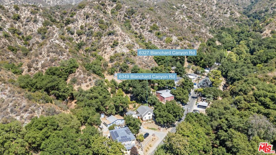 This property is an exceptional and rare opportunity to own 2 houses on separate lots plus a huge 3rd lot (18 acres) offering privacy, serenity and natural surroundings. The 6349 Blanchard Canyon lot has a 3 bed 2 bath house with original charm, large primary bedroom with lovely wood beamed ceilings, private bath and lots of windows overlooking the back patio. This house also features a large living room with built-in bookshelves, a separate dining area, laundry, hardwood floors and large 2 car garage. The 6327 Blanchard Canyon lot has an 1,800 sq ft 1 bed 1.5 bath house with amazing open living room space, plus workshop/office and 3 lofts for a multitude of uses. This inspiring home and workshop has high ceilings, cement floors, roll up garage door, great A/C and two storage sheds. Outside, multiple garden spaces create the perfect setting for relaxing, entertaining, or simply enjoying nature, quiet and butterflies. The flexible spaces create options: family compound or private retreat, or rent one house and live in the other or separate the lots. The property is just minutes to the charming Montrose Village, cafs, shopping and farmers market. Easy access to the 210 Freeway. With no rear neighbors, enjoy close proximity to Angeles National Forest, Deukmejian Wilderness Park, and Haines Canyon Trails, a paradise for hikers, bikers, and nature lovers in a scenic neighborhood. The 3 bedroom house is tenant occupied. Please do not disturb occupants.