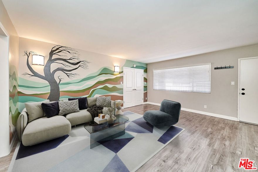 Welcome to this beautifully updated 2-bedroom, 1-bathroom upper-level condominium located in a quiet gated community in the heart of Reseda. This light-filled home offers an open floor plan with a spacious living room that flows seamlessly into the dining area and remodeled kitchen, complete with modern cabinetry and updated finishes. The unit features laminate wood-look flooring throughout, large windows bringing in natural light, and generous closet space in both bedrooms. The recently refreshed bathroom adds a touch of contemporary style. Community amenities include a sparkling swimming pool, well-maintained landscaped courtyard, and on-site laundry facilities. One assigned covered parking space is included. Conveniently situated near shopping, dining, schools, and public transportation, this move-in-ready condo is perfect for first-time buyers or investors looking for a low-maintenance property in a central San Fernando Valley location.