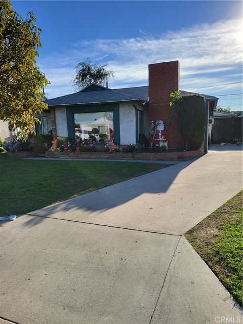 Photo of 8516 Lyndora St, Downey, CA 90242 (MLS # DW26009936)
