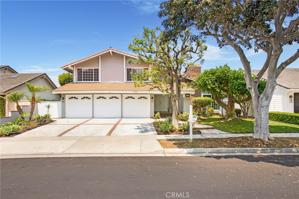 Never before on the market, this beautiful 5 bedroom, 3 bath Harbor View Home is a quality find! Recently updated with latest in quality finishes & furnishings and just LOOK at those fabulous views! Who could want for more? Nestled on a quiet single loaded street just down the street from Association Amenities this property boasts location, location, location! And let's talk education, 2220 Port Aberdeen is located in the highly sought after Newport Mesa Unified School District boasting award-winning Blue Ribbon Schools. Look no further family & friends, here you've found your dream home in a location that would be anyone's perfect property. Drive up quiet streets to an attractive row of quality homes and park in front of the ample 3 car garage with additional 3 parking spots in front. The single loaded street also offers much guest parking. Enter through double doors to a spacious living room with brick fireplace up to the ceiling and dining room with kitchen and family room beyond. Downstairs bedroom and bathroom offers possible multi-generational living options or the perfect private guest room. Up the hardwood stairs you'll find the Primary Bedroom Suite with abundant views and a balcony allowing you to enjoy scenes from Newport all the way to the fireworks at Disneyland. 3 other bedrooms and full bath comprise the remainder of the upstairs with plenty of hallway space in between for privacy purposes. Look no further, now you can say "Honey, I'm home!"