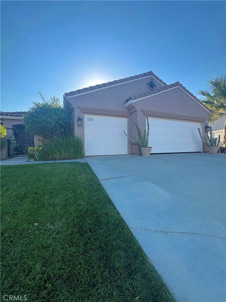 Welcome to 1281 Early Blue Lane in Beaumont! This charming single-story home is perfect for families, offering 3 spacious bedrooms, 2 bathrooms, and 1,776 sq. ft. of living space. The open floor plan provides a warm and inviting atmosphere, featuring a cozy fireplace in the living room where the family can gather for movie nights or celebrations. The kitchen flows seamlessly into the dining and living areas, making it easy to stay connected while cooking or entertaining. The primary bedroom offers a private retreat, while the additional bedrooms are ideal for kids, guests, or a home office. Sitting on a 6,970 sq. ft. lot, there’s plenty of space for outdoor play, family barbecues, or creating your dream backyard. A spacious 3-car garage provides ample parking and storage. Conveniently located near schools, parks, and shopping, this home is designed with family living in mind.