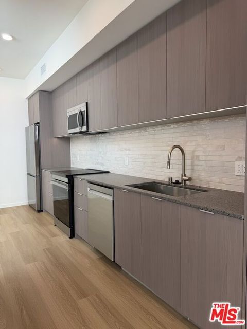 Photo of 5119 Colfax Avenue #304, Valley Village, CA 91601 (MLS # 26714187)