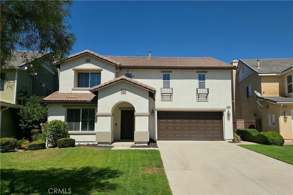 This spacious home offers just over 2,600 square feet of living space and is move-in ready. The upgraded kitchen includes granite countertops, a center island, built-in refrigerator, double ovens, and abundant storage. Fresh interior paint and new luxury vinyl plank flooring combined with new carpet in select areas to create a clean, updated look. The functional layout features generous room sizes and multiple living spaces, while the private backyard includes both patio and lawn areas.