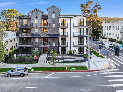 Photo of 10352 Riverside Drive #203A, Toluca Lake, CA 91602 (MLS # GD26035801)