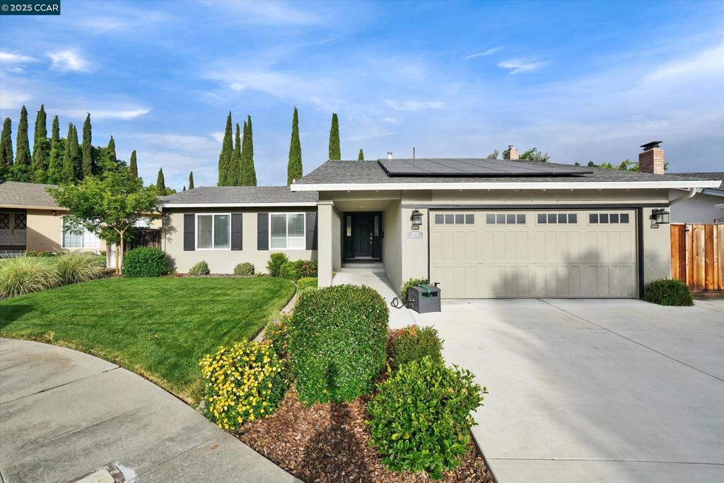 Nestled in a serene cul-de-sac within Pleasanton’s coveted Muirwood neighborhood, this stunning single-level ranch-style home exudes charm and modern elegance. Thoughtfully updated and meticulously remodeled, it features four spacious bedrooms, two luxurious bathrooms, and a grand living room seamlessly connected to an expansive, beautifully redesigned eat-in kitchen. Impeccably maintained, this home offers exceptional craftsmanship and comfort. Highlights include a sparkling refinished in-ground pool, an eco-friendly 42 panel, owned solar system, and a generous lawn with ample setbacks for privacy and relaxation. Perfect for move-up buyers or those with extended family, this residence is ideally situated near top-rated schools, vibrant shopping, and local businesses, blending sophistication with convenience.