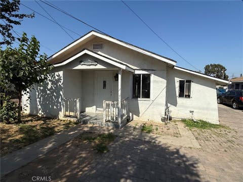 Photo of 560 S McDonnell AVE, Los Angeles, CA 90022 (MLS # PW26142646)