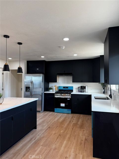 Photo of 9841 Cockatoo Lane, Garden Grove, CA 92841 (MLS # OC25225709)