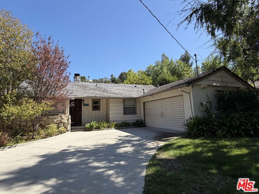 This 3-bedroom home offers the perfect blend of comfort and convenience, just south of Ventura Fwy (I-101). Featuring approximately 1,544 sq. ft. of living space on a spacious 7,570 sq. ft. lot, it includes open, airy interiors ideal for both relaxation and entertainment. A cozy fireplace in the living room and large windows throughout fill the home with natural light. The kitchen and bathrooms have been remodeled, and appliances include a refrigerator, washer & dryer, dishwasher, and range/oven. Enjoy ample counter space and plenty of storage. The lovely backyard is perfect for gatherings or quiet retreat. The attached garage also includes a separate room with AC, great for storage, an office, or a hobby space. Located in a desirable neighborhood close to shopping, dining, parks, and schools.