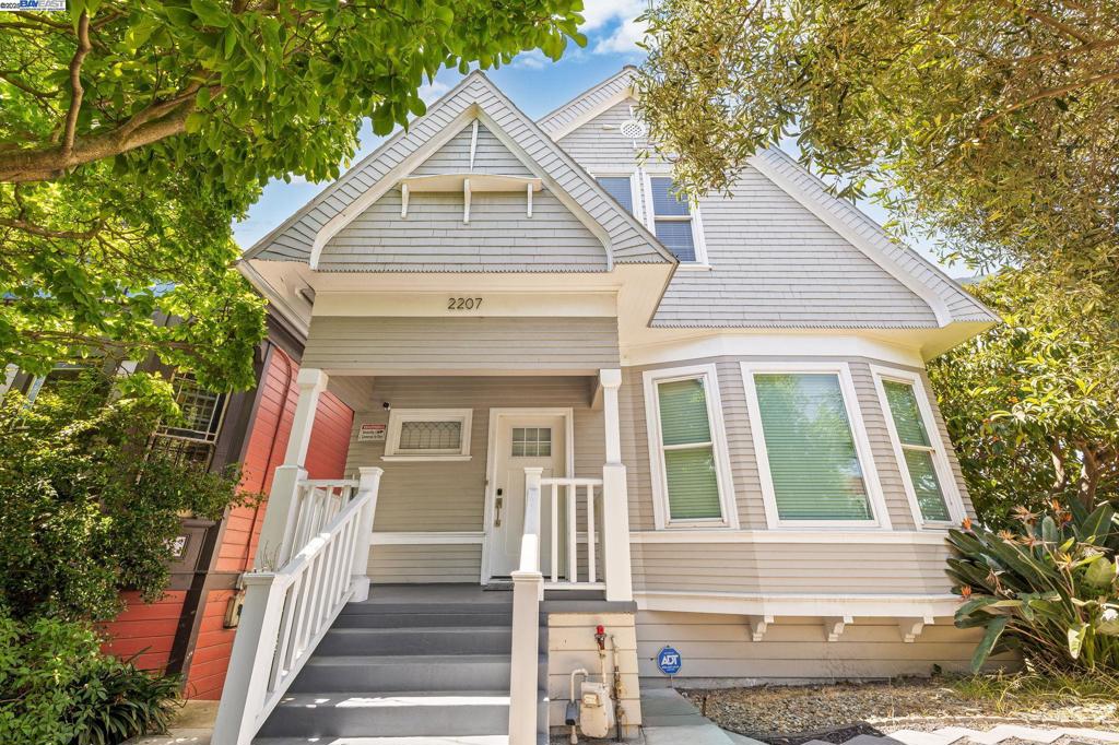 Exquisitely restored Victorian masterpiece in Oakland's Highland Terrace. This stunning 5-bedroom, 3.5-bath home spans 2,650 sq ft on a rare double lot, blending historic charm with modern luxury. Features gleaming hardwood floors, upgraded kitchen with stainless appliances and Carrara marble countertops, dual HVAC, Google Nest technology, and full basement storage. Exceptional corner property offers three automatic gates, premium security, and extensive off-street parking with unique three-sided access for unparalleled convenience and privacy. Multiple dedicated parking areas accommodate vehicles and guests. Expansive private grounds provide endless possibilities for entertaining, gardening, and relaxation. Generous lawn and sundeck create perfect gathering spaces, while the rare double lot offers unmatched outdoor space difficult to find in urban settings. Remarkable property delivers perfect blend of tranquil residential living and urban accessibility—rare opportunity to own a truly special home combining Victorian elegance with modern amenities.