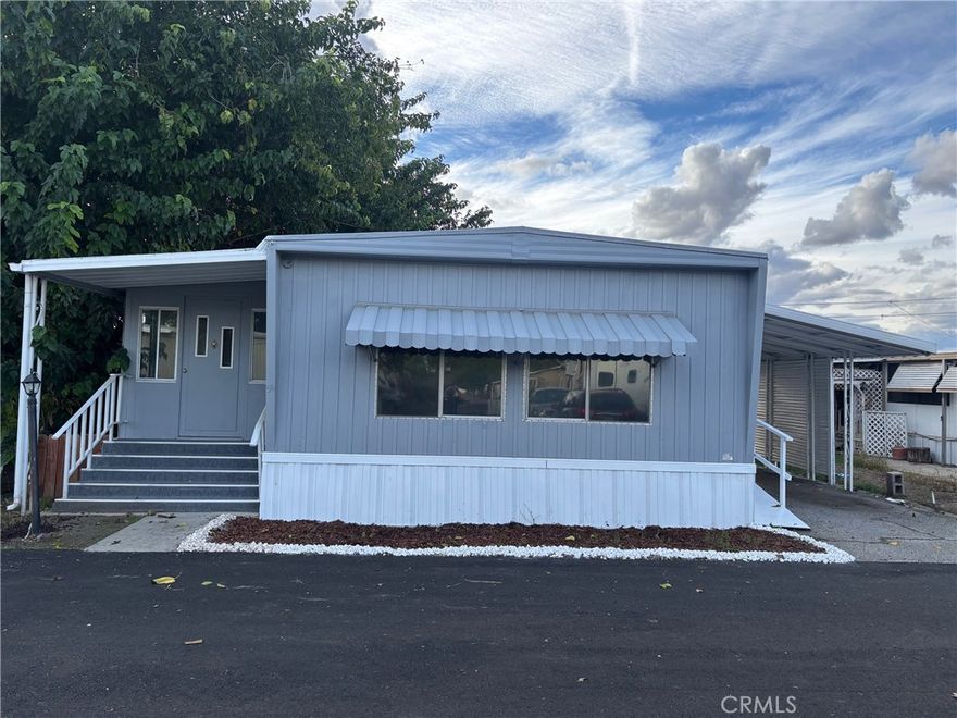 Beautifully updated 1969 Kit Fairview Mobile Home in the Hemacinto Community of San Jacinto, California. This well-maintained home features modern updates throughout, including refreshed fixtures and updated kitchen appliances. The functional floor plan offers 2 bedrooms and 1.5 bathrooms, providing comfortable and practical living. Located in a welcoming community with affordable space rent of just $695 per month, this home presents an excellent opportunity for affordable and updated living.