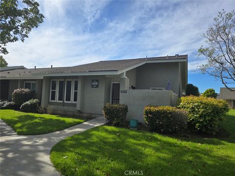 Photo of 8766 Tulare Drive #406F, Huntington Beach, CA 92646 (MLS # OC26040151)