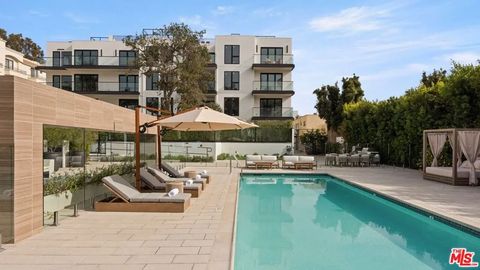 Photo of 505 S Barrington Avenue #106, Los Angeles, CA 90049 (MLS # 26669241)