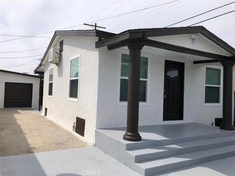 Photo of 6563 Kansas Avenue, Los Angeles, CA 90044 (MLS # DW26066132)