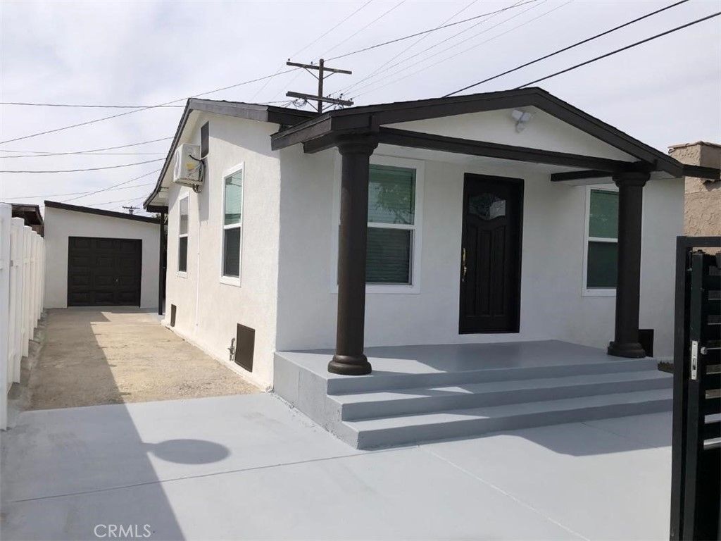 Photo of 6563 Kansas Avenue, Los Angeles, CA 90044 (MLS # DW26066132)
