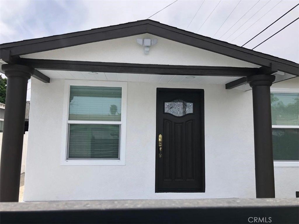 Photo of 6563 Kansas Avenue, Los Angeles, CA 90044 (MLS # DW26066132)