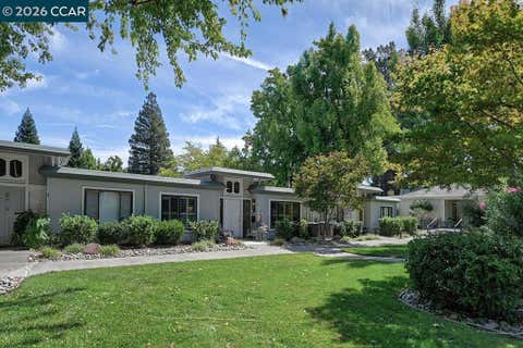 Photo of 2301 Tice Creek Dr DR #5, Walnut Creek, CA 94595 (MLS # 41146321)